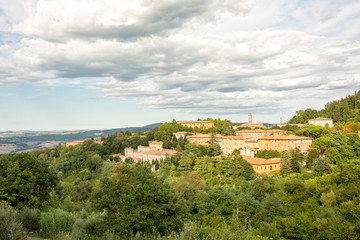 Fototapeta na wymiar View on the hills and houses near Volterra, Tuscany, Italy.