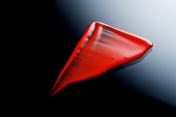 Lipgloss texture with black background