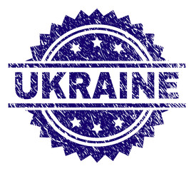 UKRAINE stamp seal watermark with distress style. Blue vector rubber print of UKRAINE tag with retro texture.