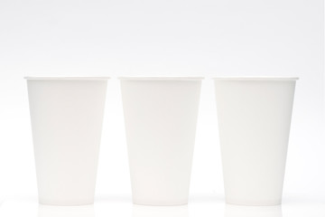 White paper cups on a white background