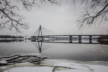 bridge over river in winter