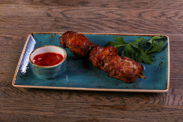 Beef skewer with sauce