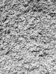 Gray plaster coat on the wall as a background