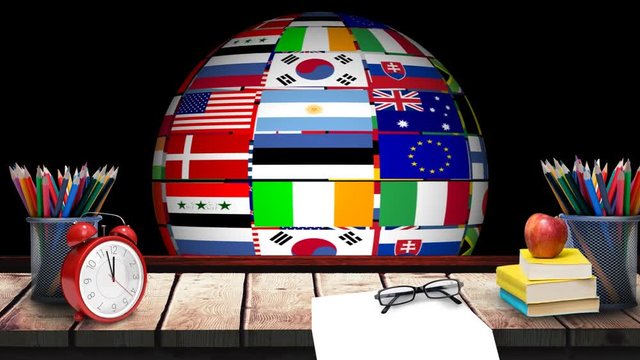 Spinning multinational Globe and school supplies