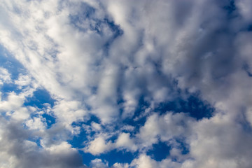 Clouds against blue sky as abstract background
