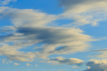 Obraz premium Clouds after rain before sunset as a background