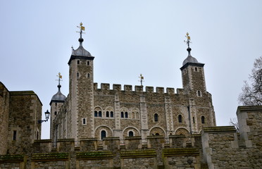 The Tower of London with the White Tower from Thames River walk. London, United Kingdom.