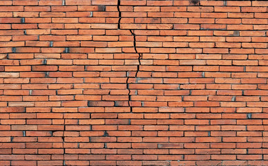 Old red brick wall cracked