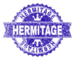 HERMITAGE rosette stamp seal imprint with grunge texture. Designed with round rosette, ribbon and small crowns. Blue vector rubber watermark of HERMITAGE caption with unclean texture.