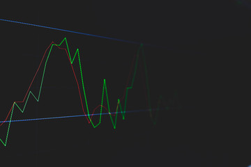 Stock market trading graph and candlestick chart on screen for businese financial investment concept. Economy trends background. Abstract finance and invest background.