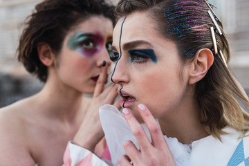 Street performers gossiping while acting