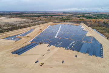 the construction of the landfill and installation of geomembrane