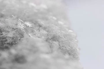 Downy snow with snowflakes for background