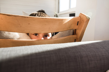 Portrait of a smiling and happy child at home. Child with joyful expression