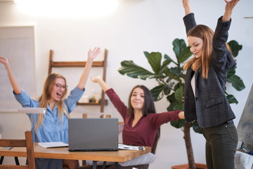 Happy Successful teamwork throwing work year planning paper in the Air. Business Corporate People Working Concep