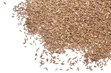Pile of cumin seeds on white background
