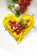 Decorative heart shaped spaghetti Bolognaise