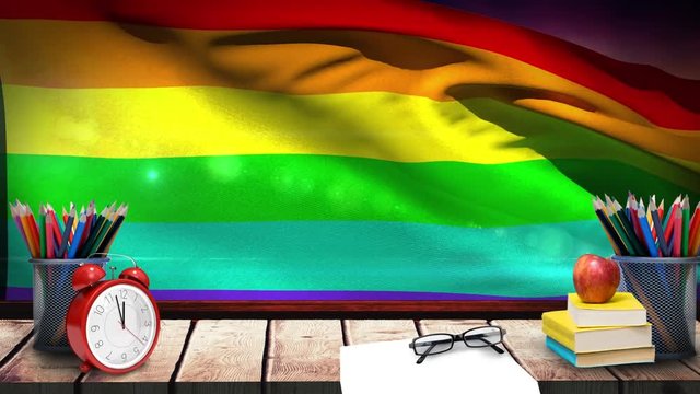 Rainbow flag with school supplies