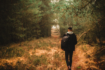 young man in the forest