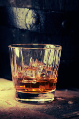 Glass of scotch whiskey in close-up
