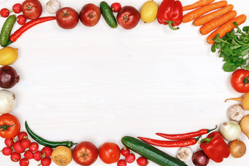 Vegetables and fruits on a white wooden table. Top view. Copy space.