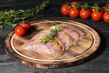 Cutting fish. Sturgeon. On dark background