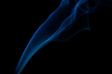 Fototapeta premium Colorful smoke close-up on a black background