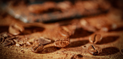 Product hero shot of coffee beans and wooden desk space 