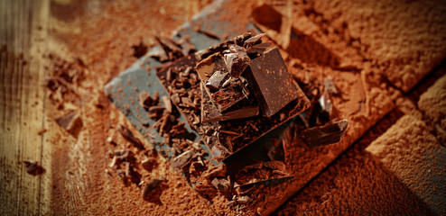 Product hero shot of chocolate on wooden desk. 