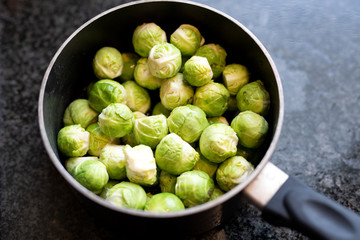 Saucepan of prepared brussel sprouts ready for cooking