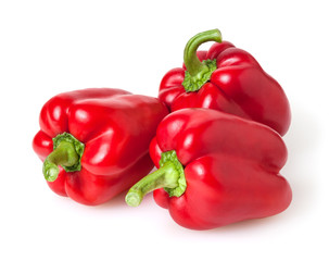 Fresh red bell peppers isolated on white background