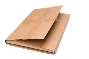 Cardboard book mailer on white background.