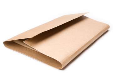 Cardboard book mailer on white background.