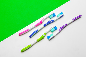 toothbrush on green background, dental care concept