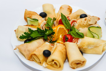 delicious pancakes with different fillings from the chef of the restaurant