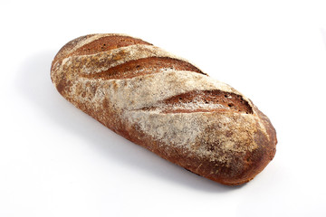 Fresh bread on white background. Beautifully sprinkled with flour.