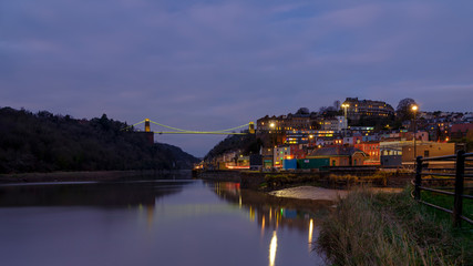 Fototapeta na wymiar Night view of Clifton Suspension Bridge and Avon Gorge from near the Cumberland Basin, Bristol, UK