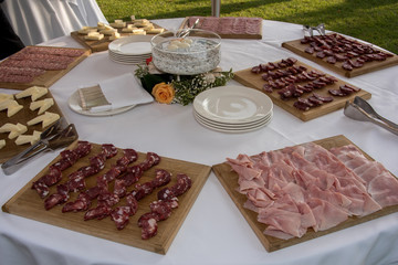 table with buffet and aperitifs for wedding ceremony