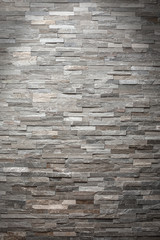 Steinwand Hintergrund mit Steinriemchen Ziegel Mauer Rustikal Dunkel Grau