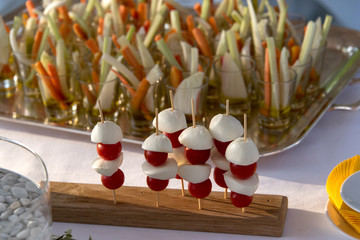 table with buffet and aperitifs for wedding ceremony