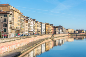 View on embankment of Arno river Pisa, Italy.