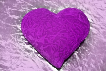 Valentine's day violet heart on a silver background