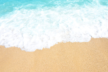 Soft wave of ocean on the sandy beach