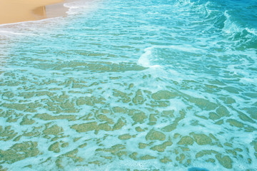 Soft wave of ocean on the sandy beach