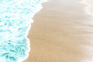 Soft wave of ocean on the sandy beach