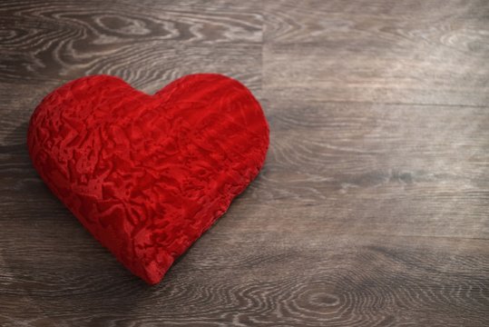 Valentine's day red heart on a silver background