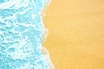 Fototapeta na wymiar Soft wave of ocean on the sandy beach