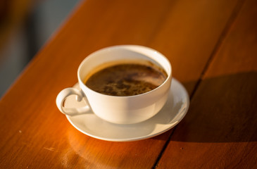 coffee cup  on wood table.