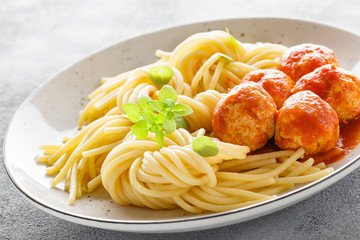 Spaghetti with meatballs in tomato sauce