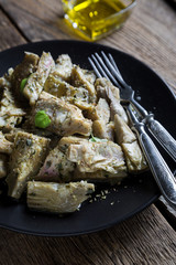 Baked artichokes with olive oil and herbs